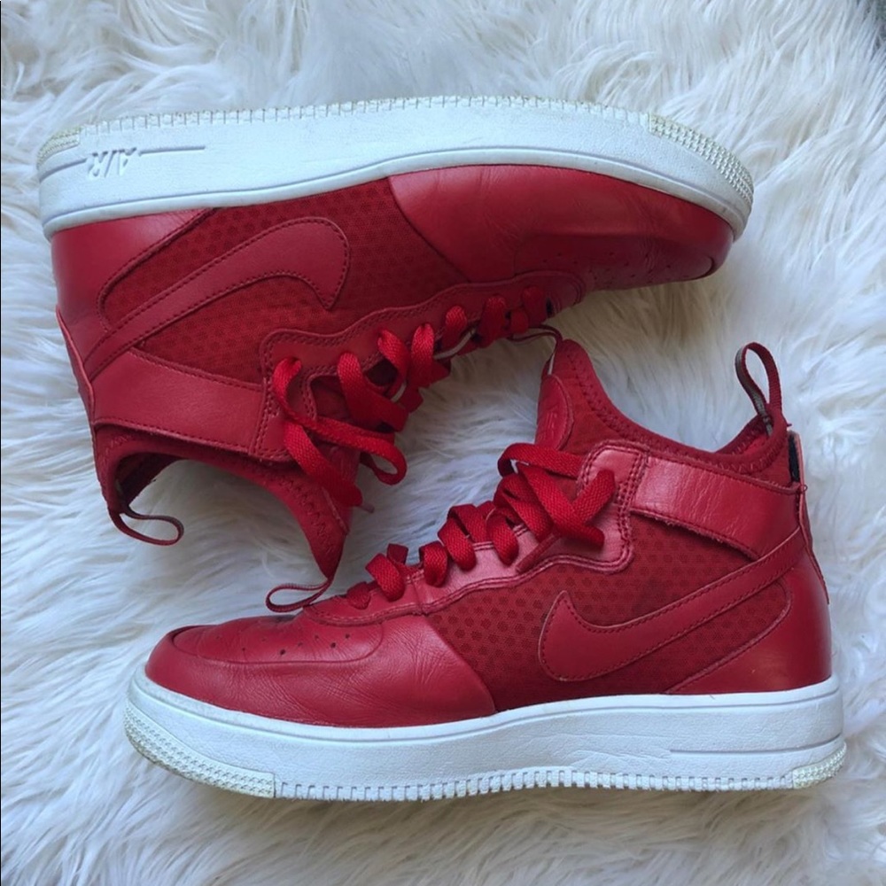 Red flexible Nike Air Force ones